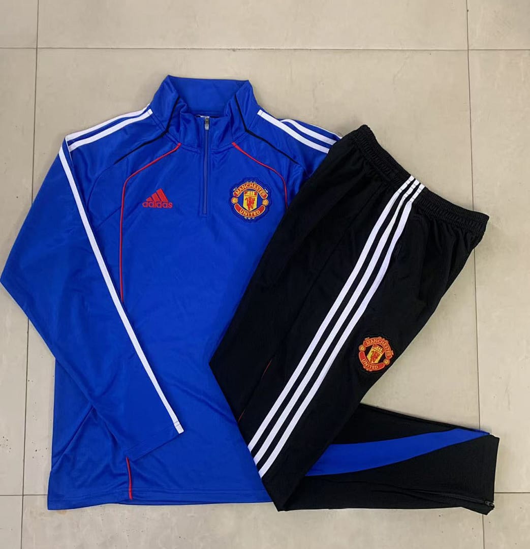 Manchester United 25/26 Sudadera Niño · Azul · Retro