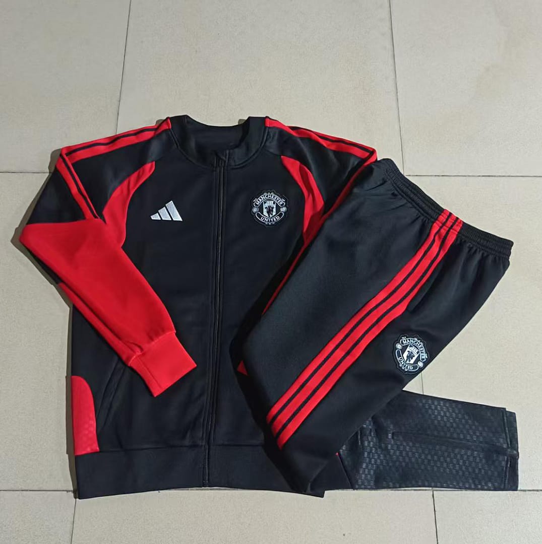 Manchester United 26/27 Chaqueta Niño · Negro · Detalles Rojo