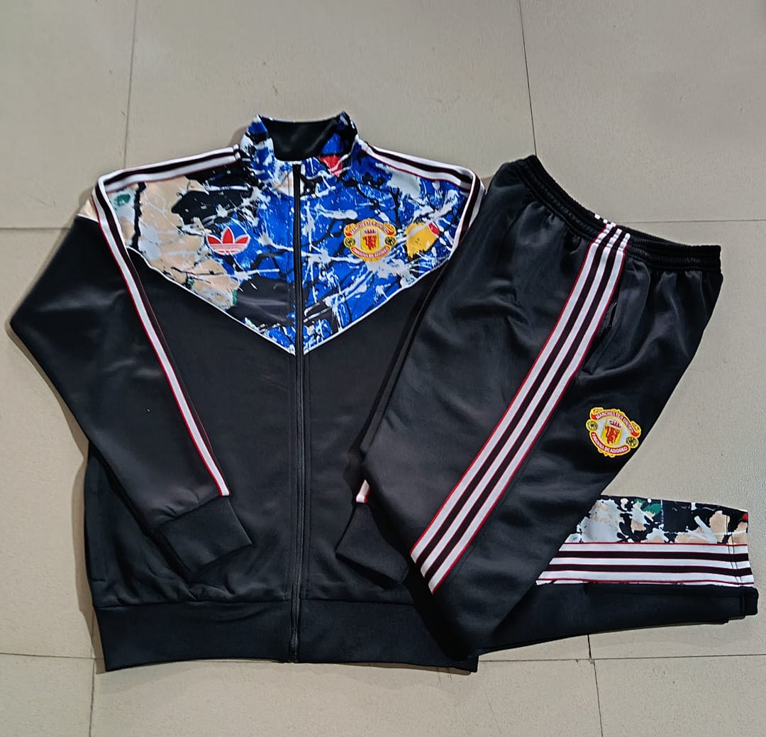 Manchester United 26/27 Chaqueta Niño · Negro · Stone Roses